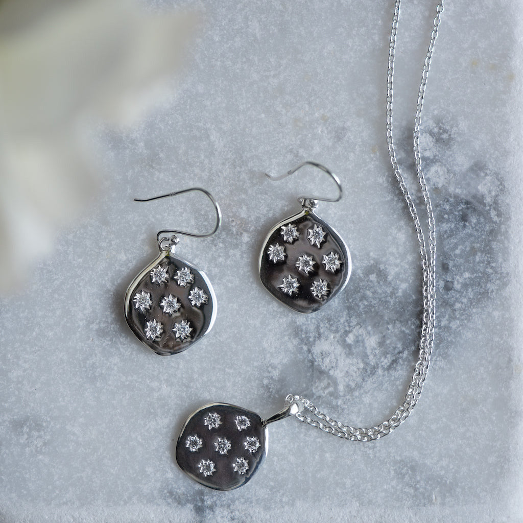 stargazer zirconia silver pendant with matching earrings