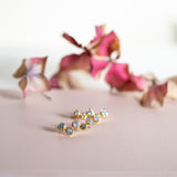 aquila topaz gold ear studs from memara