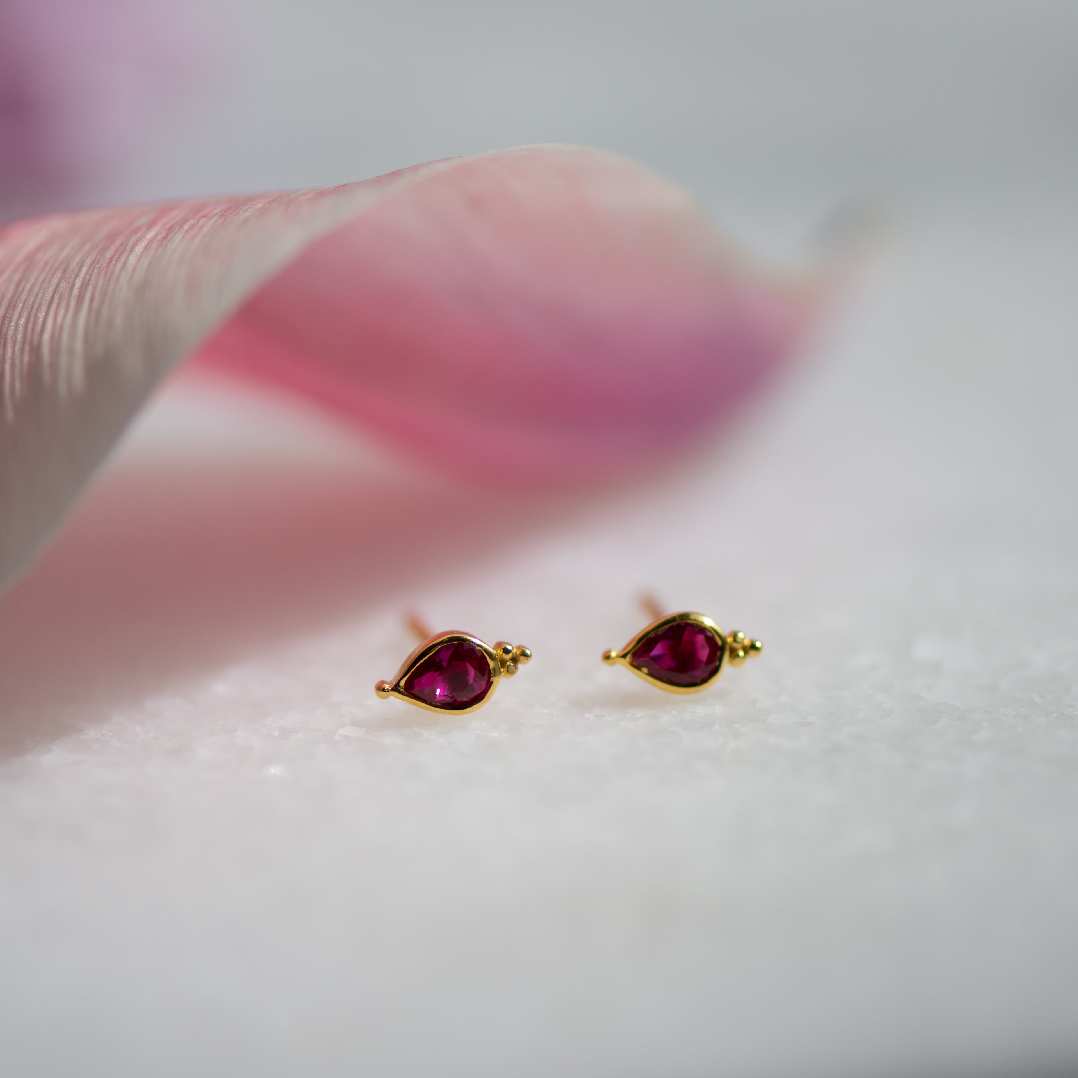 dudley ruby zirconia pear-shaped gold ear studs from memara