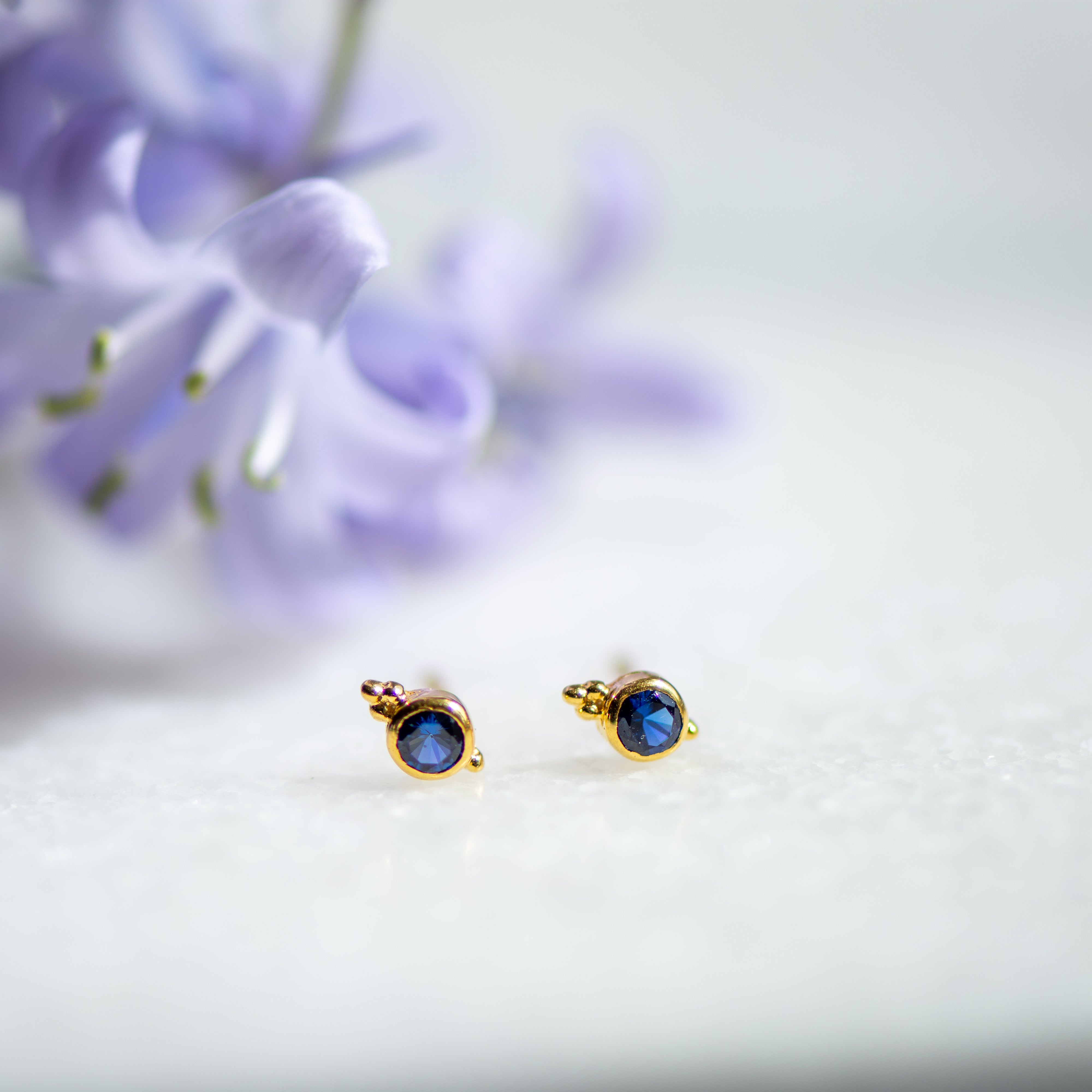 dudley sapphire zirconia gold stud earrings from memara