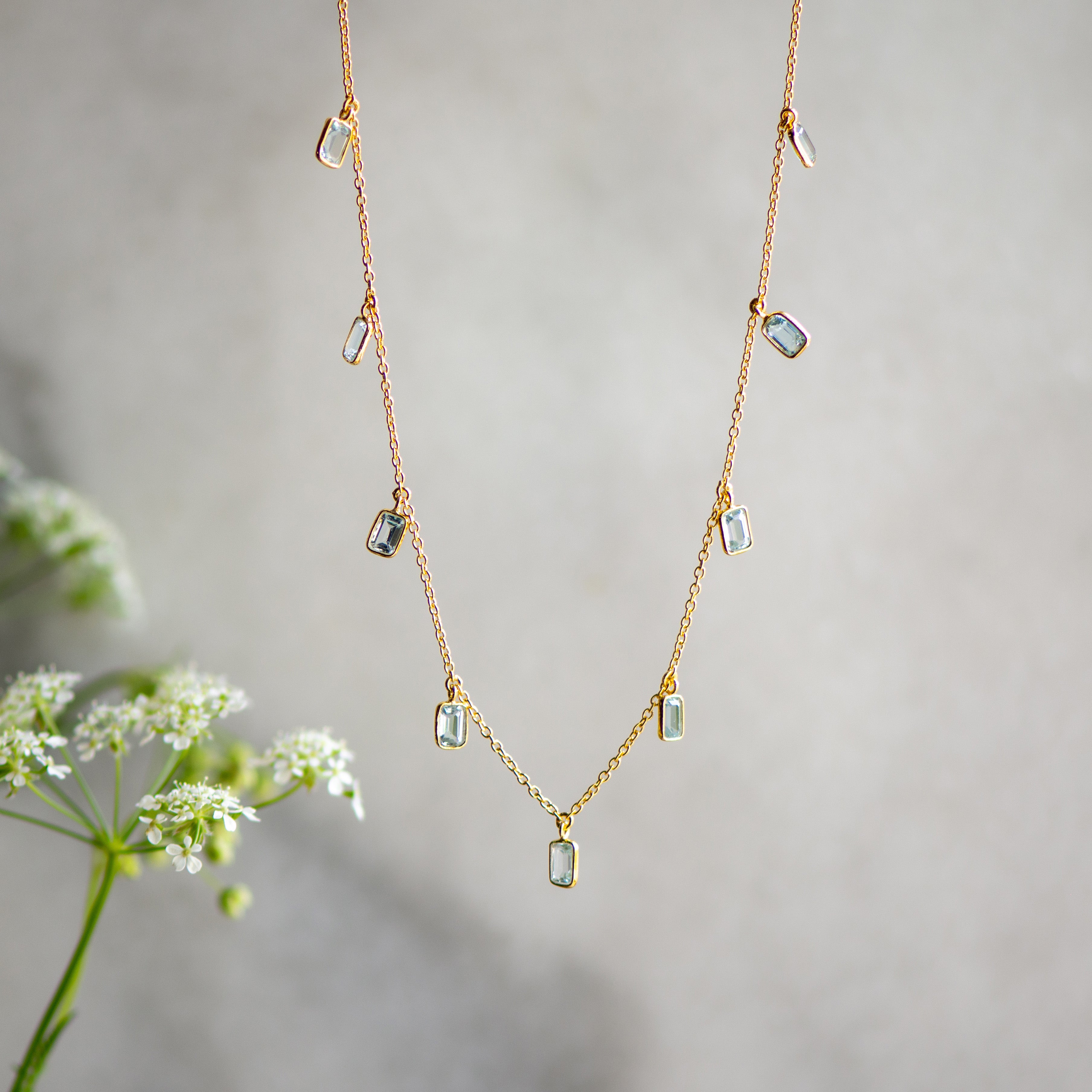 tiggy gold necklace with sky blue topaz from memara