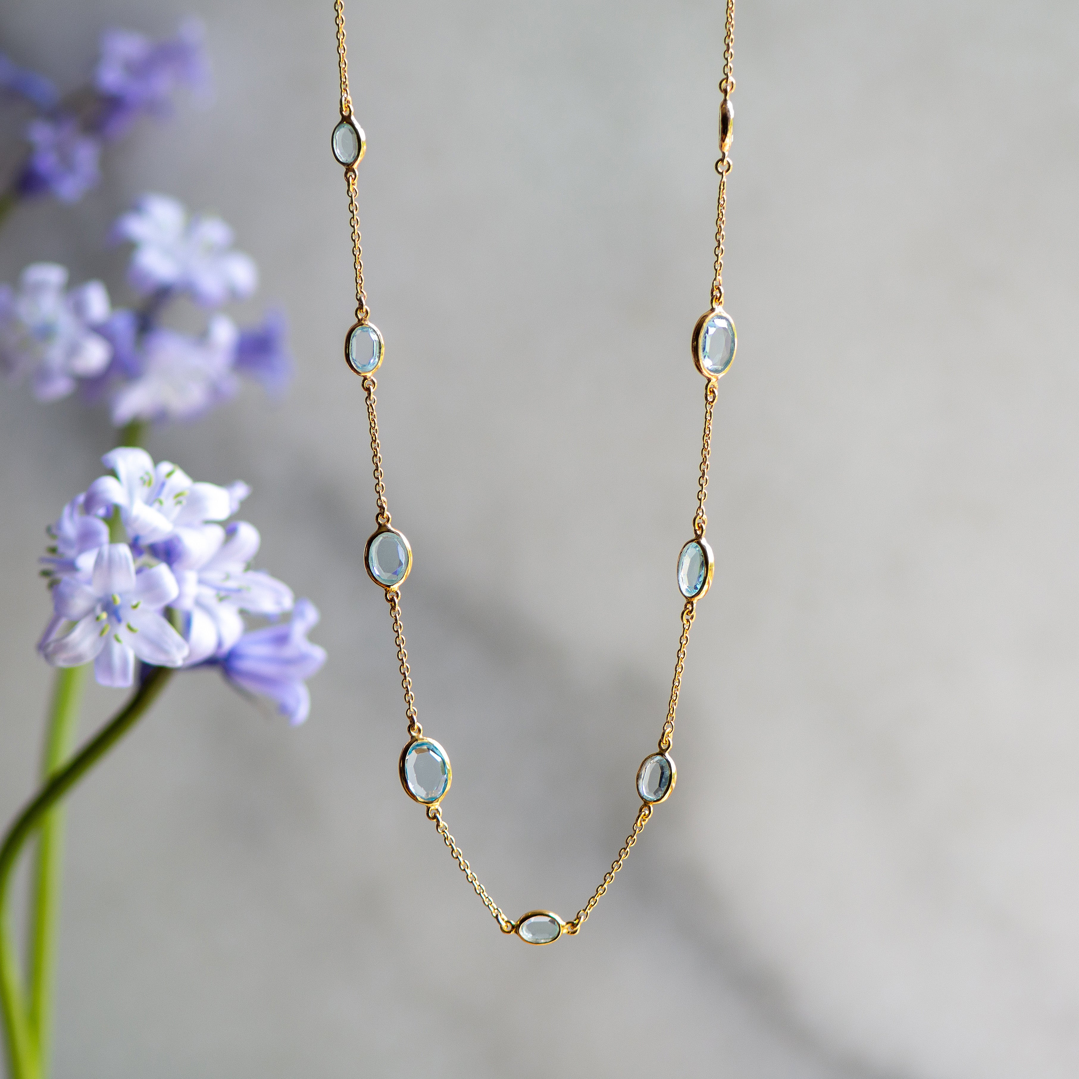 marilyn gold necklace with sky blue topaz from memara