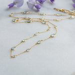 double marilyn gold necklace with sky blue topaz from memara