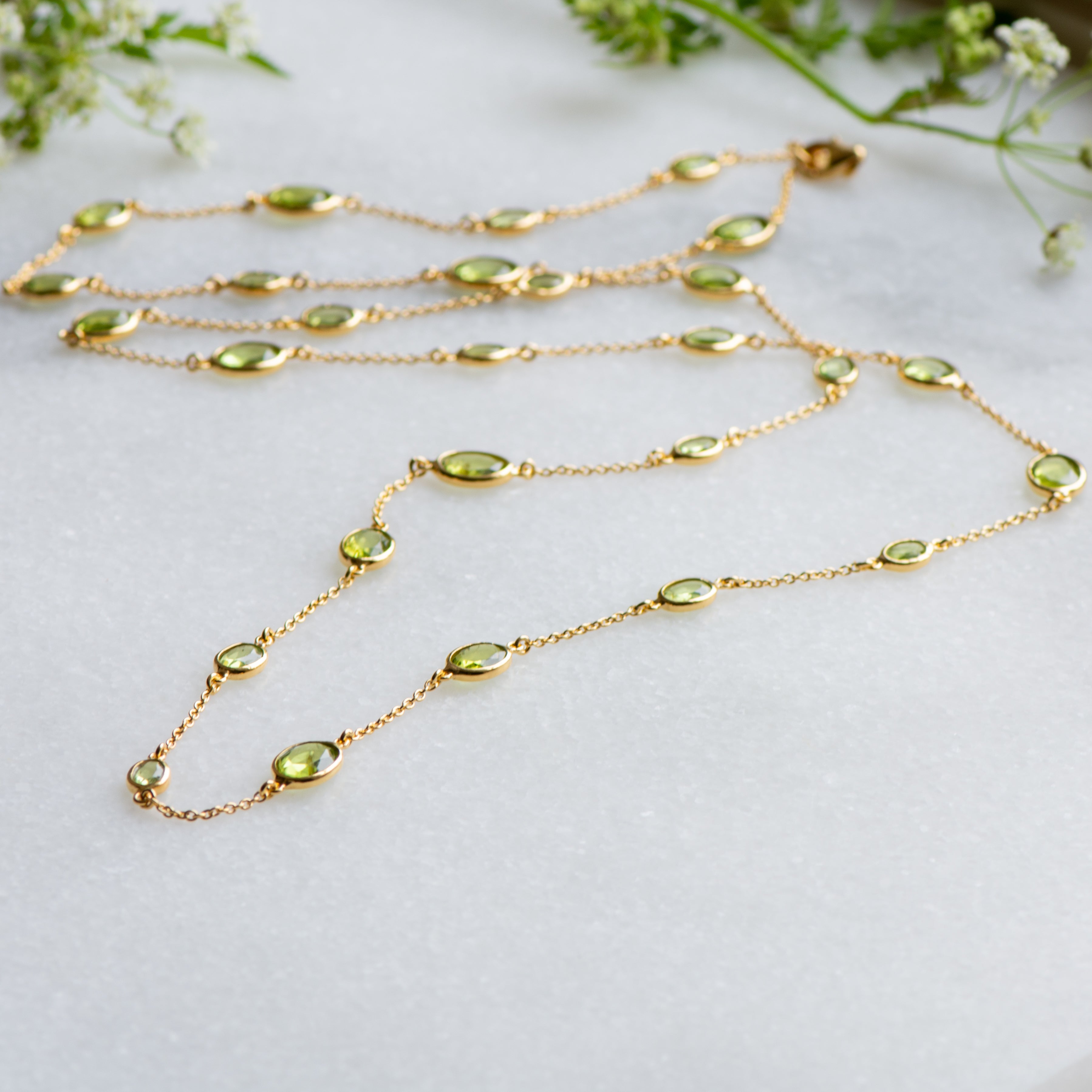 double marilyn gold necklace with peridot from memara