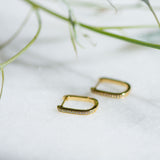 Oval Crystal Charm Hoops in Gold