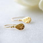 Mirage Drop Earrings in Gold and White Zirconia from Memara