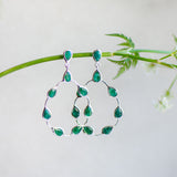 Tikka in silver with pear shaped emerald droplets