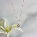 bejewelled star charm gold pendant from memara