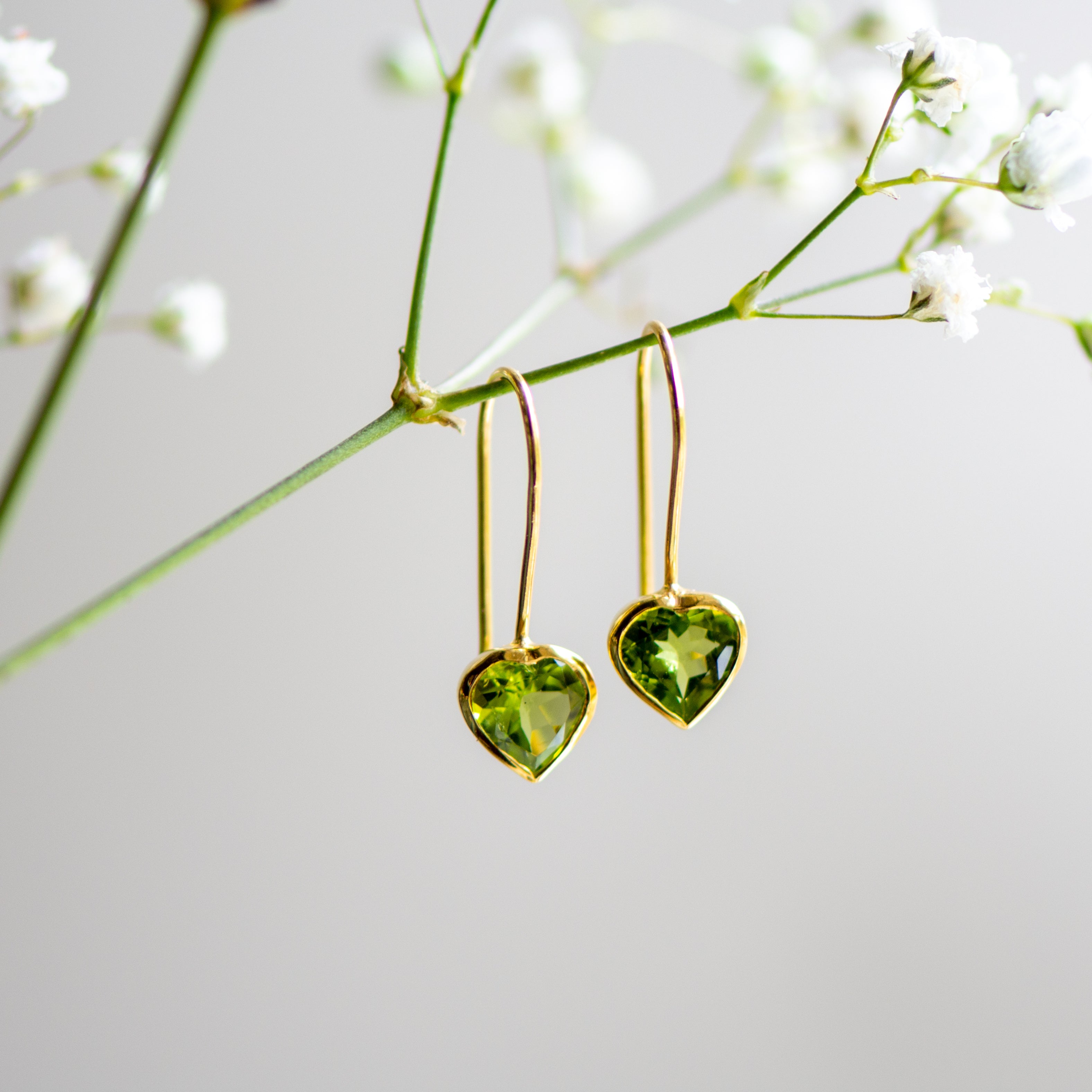 peridot gold heart drop earrings from memara