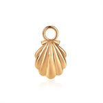 gold shell charm from memara