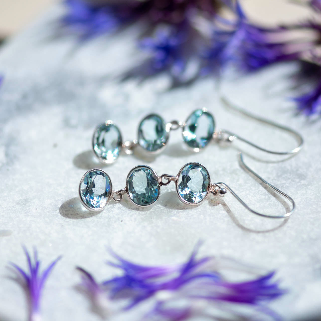 trellis blue topaz silver earrings from memara