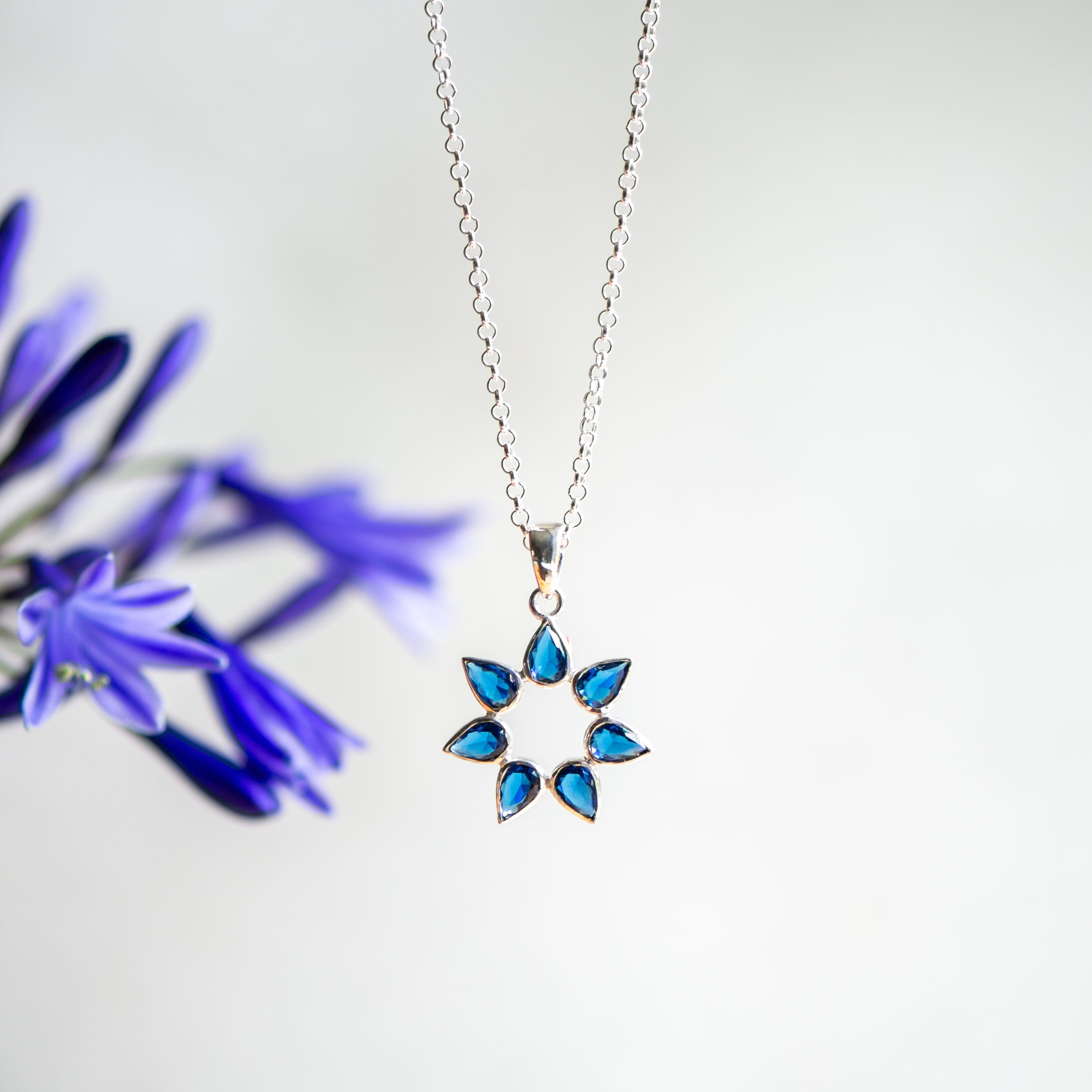 flower silver pendant with sapphire from memara