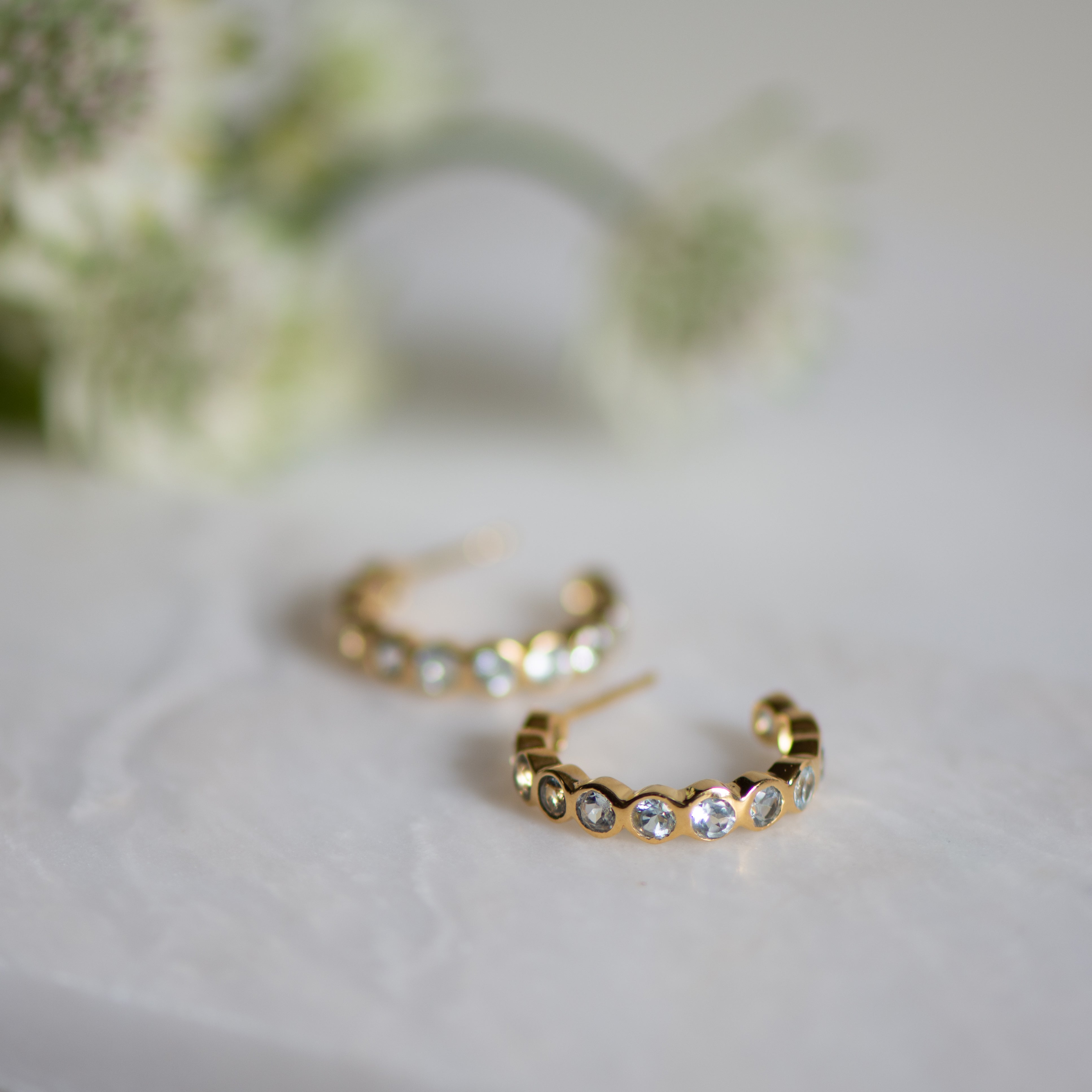 blue topaz gold hoop studs from memara