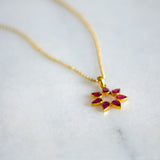 flower gold pendant with ruby petal from memara