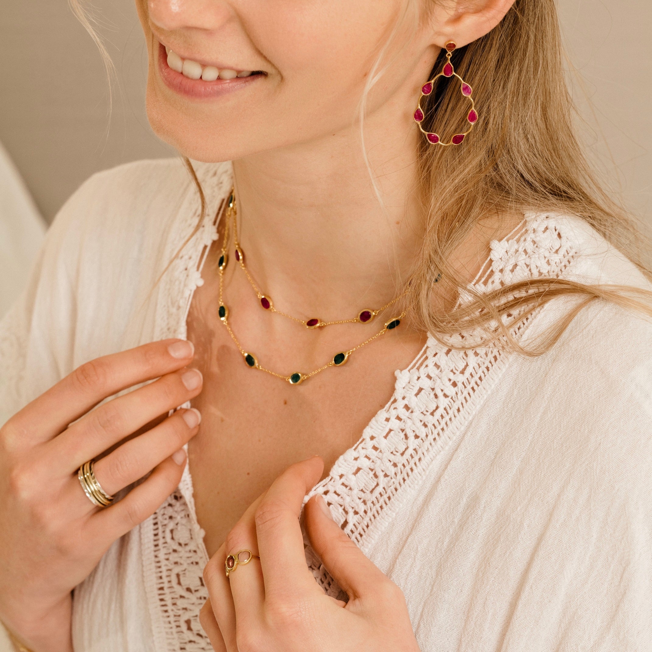 Tikka in Gold with pear shaped ruby droplets. Earring Memara 